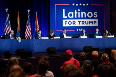 US President Donald Trump (L) and others participate in a roundtable rally with Latino supporters at the Arizona Grand Resort and Spa in Phoenix, Arizona on September 14, 2020.