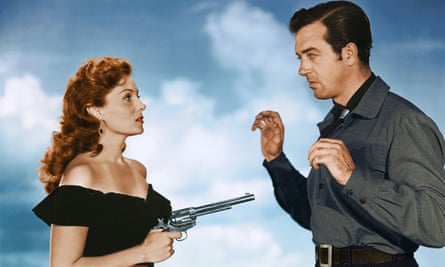 Fleming pulls a gun on John Payne in a publicity shot for The Eagle and the Hawk (1950)