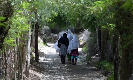 Women walking in rural Pakistan. 