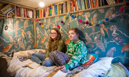 Two young Jane Austen fans sitting in their bedroom at home