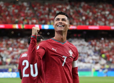 Portugal's Cristiano Ronaldo celebrates scoring their third goal.