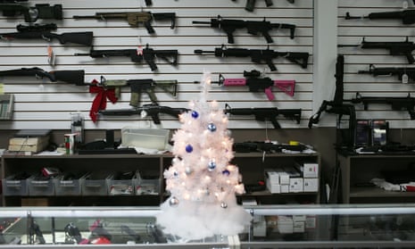 Holiday Gun Sales Soar In U.S.<br>POMPANO BEACH, FL - DECEMBER 23: A Christmas tree is seen at the National Armory gun store on December 23, 2015 in Pompano Beach, Florida. F.B.I. stats indicate that gun sales have increased dramatically this year, as reports indicate that firearms are a popular choice for a holiday present. (Photo by Joe Raedle/Getty Images)