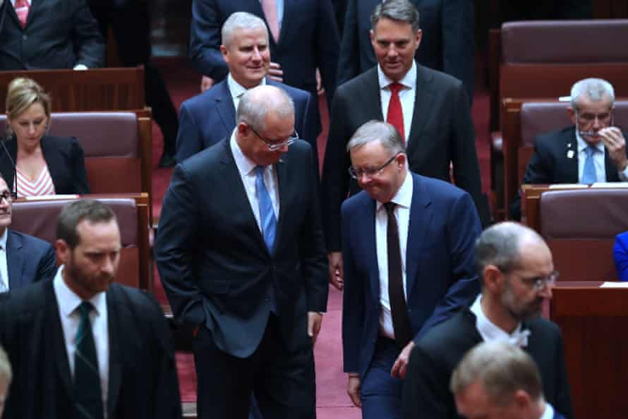 Prime minister Scott Morrison and Opposition leader Anthony Albanese gather with members and senators to watch the governor general