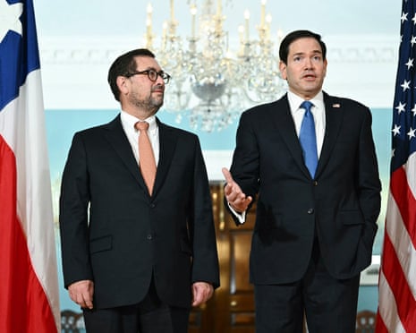Marco Rubio and Francisco Pérez Mackenna speak to members of the press in the Treaty Room of the US state department.