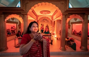 Shilpa Shah, from Bolton, England, prays at the Veda Mandir temple
