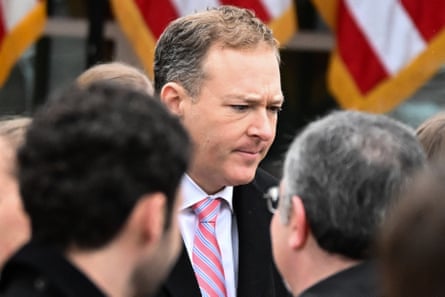 a man in a suit outside