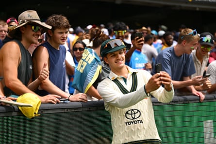 Konstas takes a selfie with fans after the Test