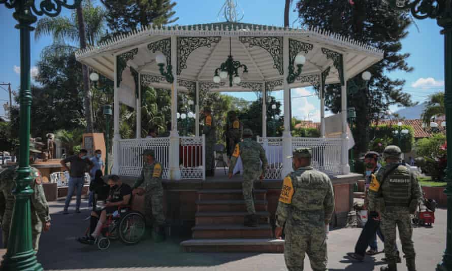 In Aguililla, a picturesque town 25 miles south of Limoncito, troops offer free haircuts and check-ups in a bid to win hearts and minds.