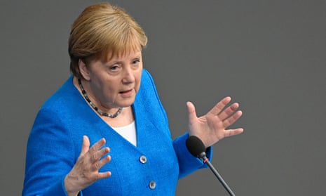 German Chancellor Angela Merkel gestures as she speaks during a session of questions at the German lower house of parliament Bundestag in Berlin on 23 June 23.
