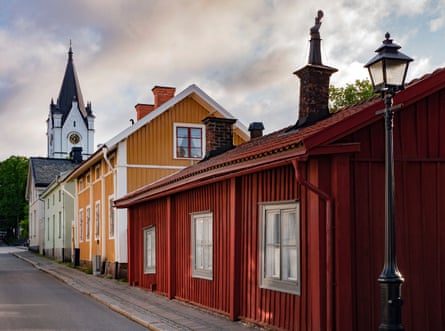Wooden buildings and church on a street