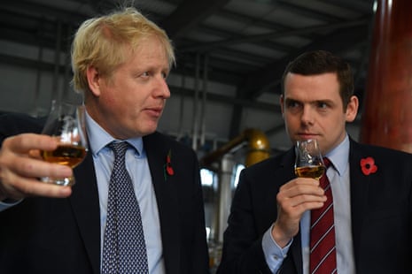 Boris Johnson with Douglas Ross (right), now Scottish Tory leader, on a visit to a whisky distillery during the 2019 election campaign.