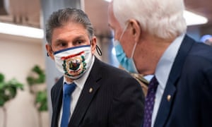 Joe Manchin (left) and John Cornyn on Capitol Hill.