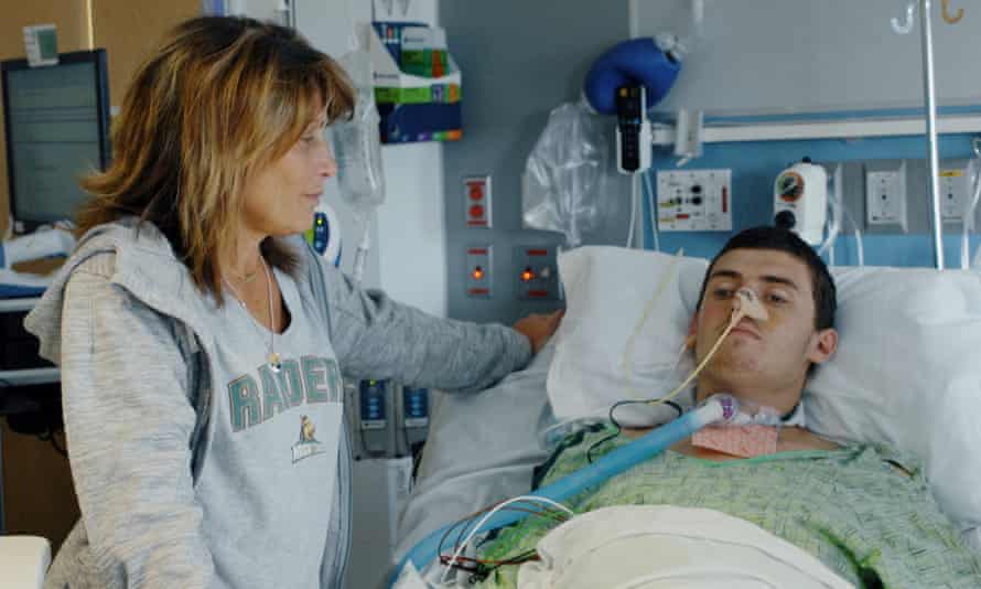 Ryan Custer's mother hovers over her hospital bed in Ending Disease.