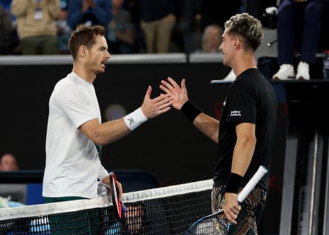 Andy Murray shakes hands at the net after his five-set victory against Thanasi Kokkinakis during day four of the Australian Open at Melbourne Park.