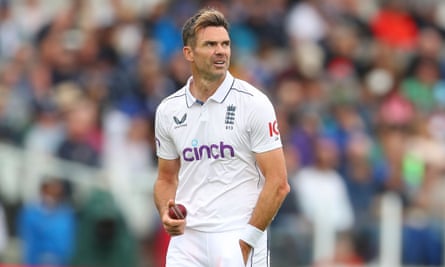 Jimmy Anderson holds the ball as he waits to bowl