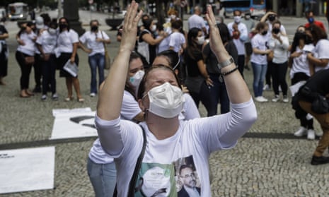 A woman during a protest by the Widows of Covid group against the way the government handled the nation's response to the new coronavirus pandemic, on the Day of the Dead in Rio de Janeiro, Brazil.