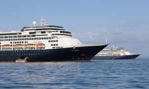 The Zaandam and its sister ship, the Rotterdam. Asymptomatic passengers were removed from the Zaandam and taken to the Rotterdam.