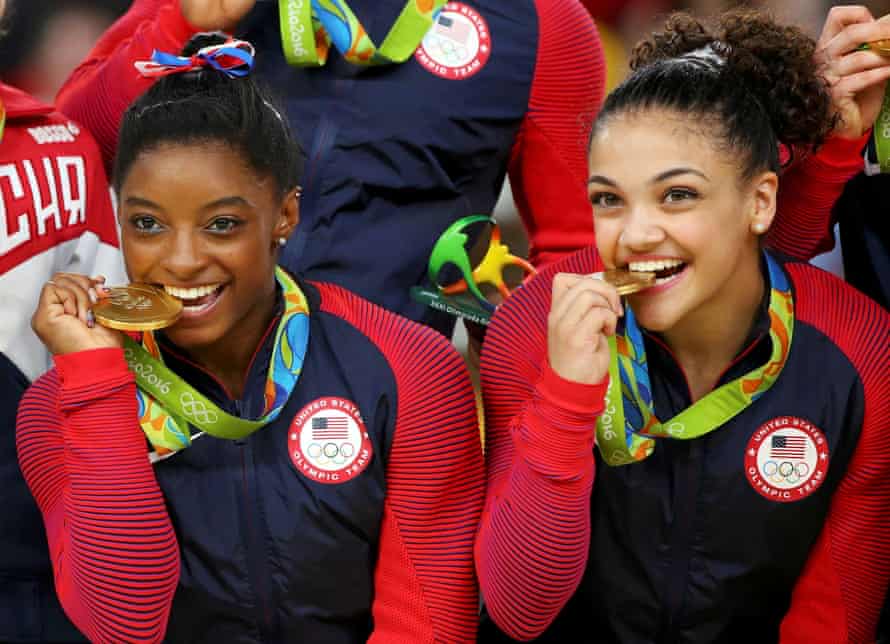 Simone Biles and Laurie Hernandez celebrate with team gold in Rio