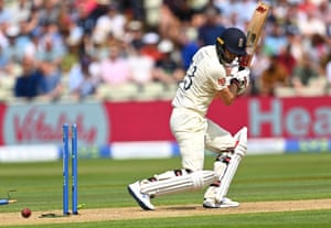 Mark Wood of England is bowled by Matt Henry for a lively 41.