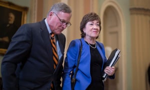 Susan Collins leaves the chamber with Richard Burr of North Carolina.