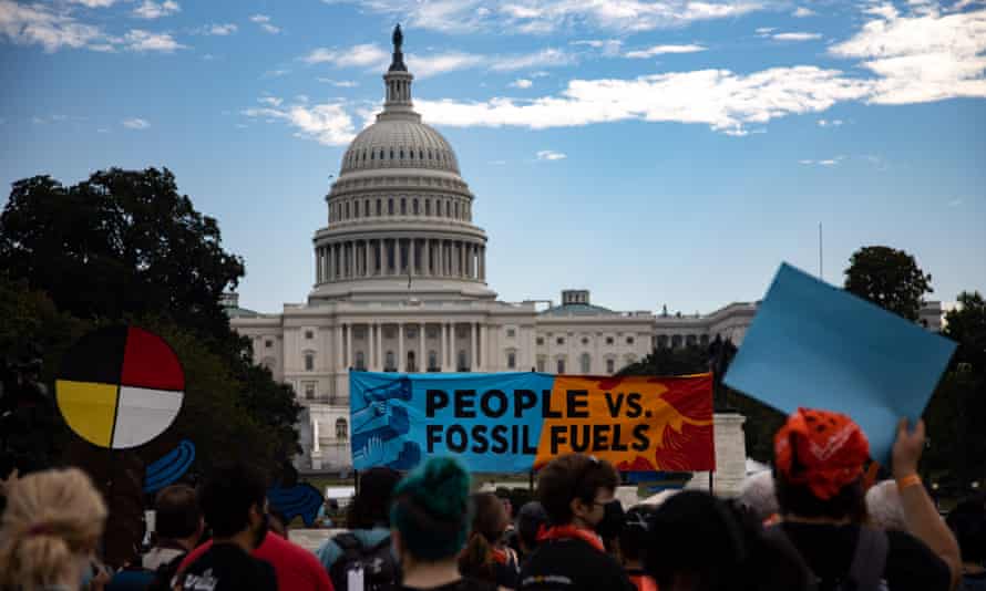 Environmental activists march to the US Capitol earlier this month.