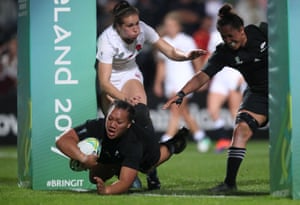 New Zealand’s Toka Natua dives in to score her third try of the game.