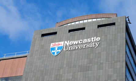 Newcastle University logo on the side of a building