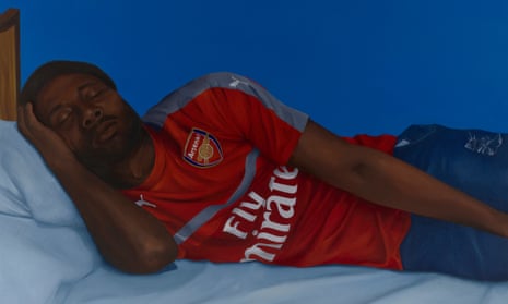Painting, called Lying by the artist Catherine Chambers, shows a man seemingly asleep on a bed in an Arsenal shirt and jeans. The bedding is cotton-type cornflower blue; the walls are a French navy hue