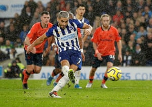 Brighton and Hove Albion’s Neal Maupay scores their second goal from the penalty spot.