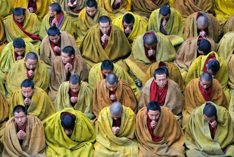 Tibetan lamas chant sutras during a prayer session at the Tashilhunpo Monastery, Tibet Autonomous Region
