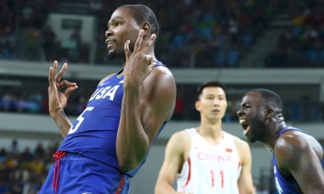 China's Yi Jianlian tries to get past Dwight Howard of the United News  Photo - Getty Images