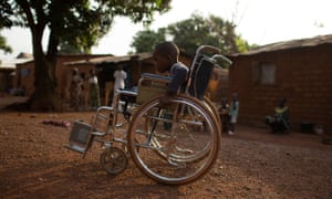 Giovanni Mougounou, 10, near his home in Bangui