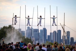 Epiphytes, presented By Cie des Chaussons Rouges, perform on high wires at Greenwich Docklands festival