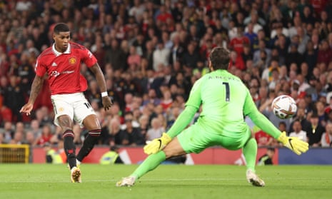 Marcus Rashford finishes coolly past Alisson to put Manchester United 2-0 up.