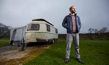Tim Jones is living in a caravan in a Derbyshire field.