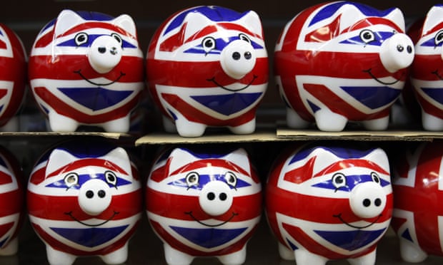 A row of souvenir Union Jack piggy banks in a shop on Oxford Street
