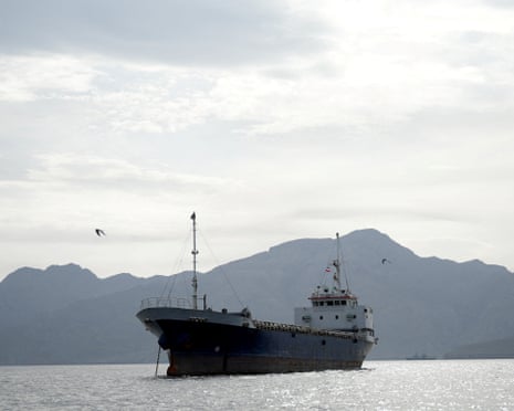 A vessel in the strait of Hormuz, off the coast of Oman’s Musandam province, on 12 April 1 2026.