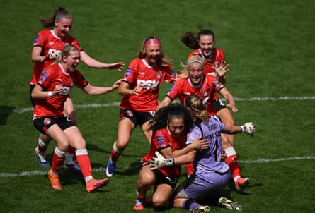 Charlton players congratulate Sophie Whitehouse after the shootout