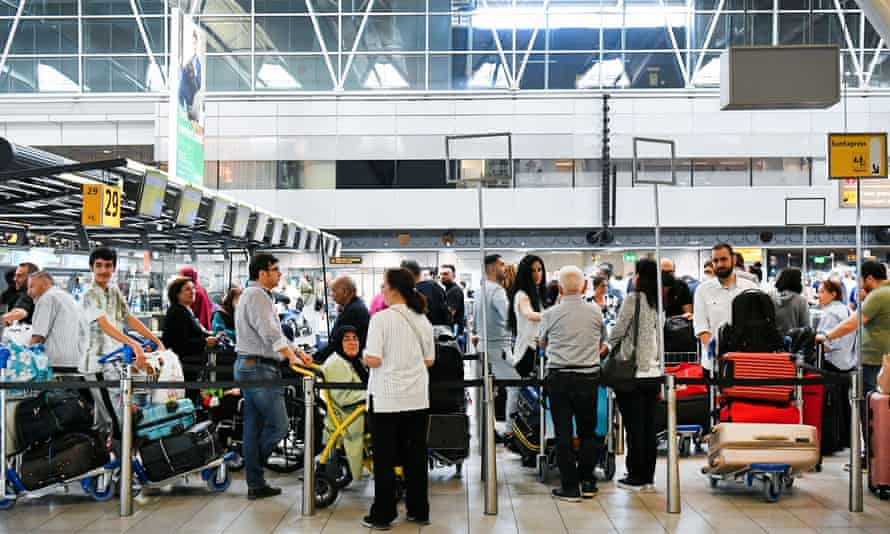 People waiting in lines at Schiphol Airport in Amsterdam, Netherlands, last week.