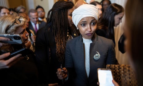 Ilhan Omar walks to her office after being ousted by the Republican-led House of Representatives to serve on the foreign affairs committee.