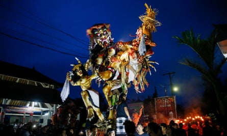 Ogoh-ogoh figures being paraded through the streets in the run up to Nyepi.