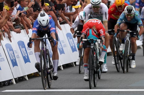 Belgian rider Jasper Philipsen (L) of team Alpecin-Deceuninck beats Australian rider Caleb Ewan (R) of team Lotto Dstny.