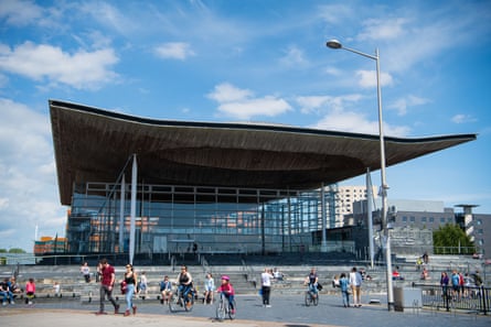 People walking and cycling outside the Senedd