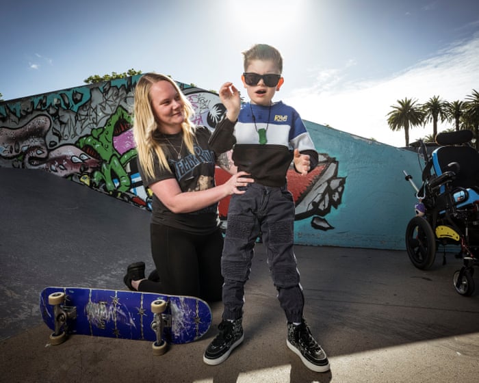 ‘This is what real inclusion looks like’: eight-year-old learns to love skateboarding despite barriers