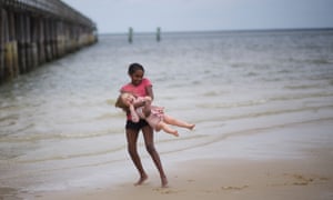 Naomi Wadler, the 11-year-old whose speech at the March for Our Lives in Washington DC made a global impact, plays on the beach with friends in Lewes, Delaware