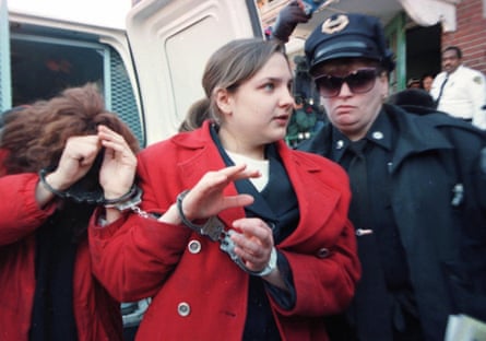 Louise Woodward is escorted into Newton district court, Massachusetts, 1997.