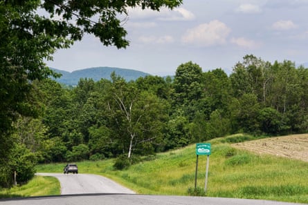 a car drives on a road