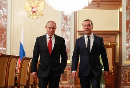 Vladimir Putin Dmitry Medvedev arive for a cabinet meeting on Wednesday
