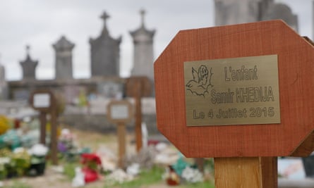 Freshly laid grave of Samir Khedija, a baby who was stillborn in Calais after her migrant mother fell off a lorry trying to get in to the UK. Photo by John Domokos for the Guardian