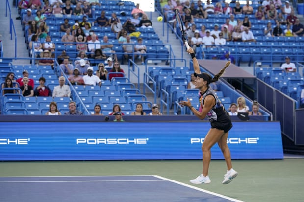 Jessica Pegula serves to Emma Raducanu at the Western and Southern Open.